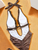 The ultimate beach show stopper Glittering Chocolate brown plunge swimsuit with ruffle accents