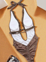 The ultimate beach show stopper Glittering Chocolate brown plunge swimsuit with ruffle accents